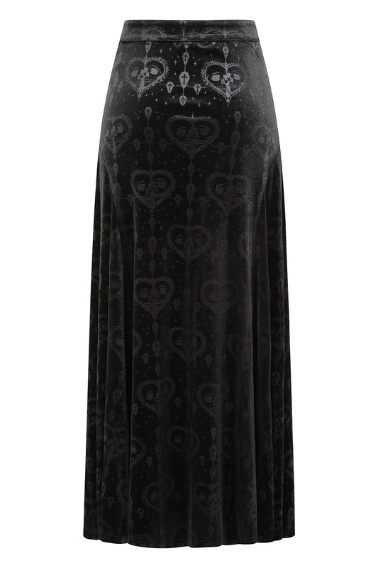 Black velvet skirt with intricate pattern on a white background