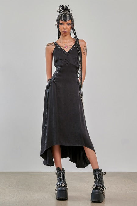 Gothic High Low Dress Black Asymmetric Banned Apparel on model with studded straps and edgy boots.
