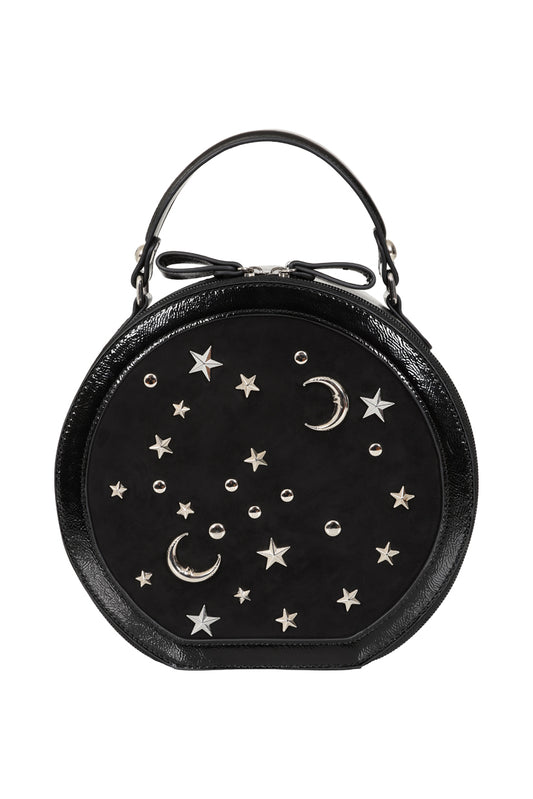 A round black leather handbag with a top handle, decorated with silver-tone metal stars, crescent moons, and dots on the front flap, set against a plain white background.