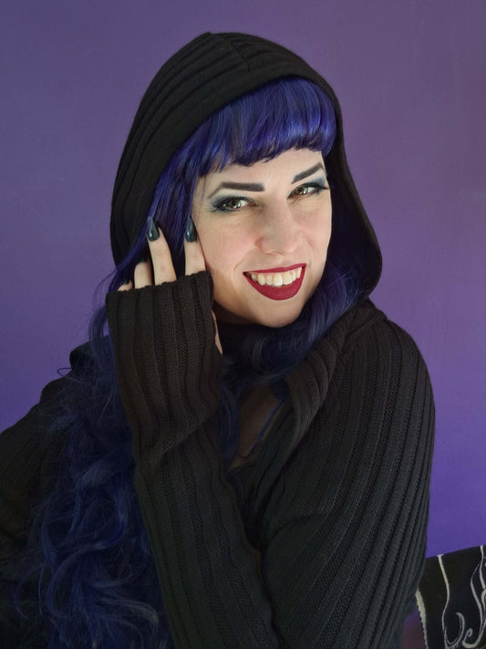 Kate Whitegroatt wearing Necessary Evil