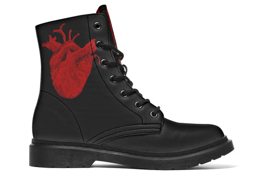 Goth combat boots with red anatomical heart artwork