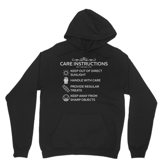Black hoodie with white “Care Instructions” humour print