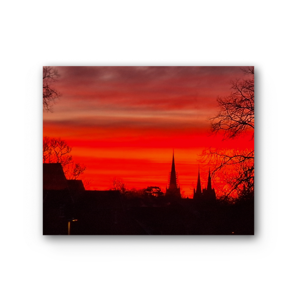 The Ember Hour premium stretched canvas with red sunset skyline