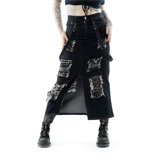 Model wearing the Vixxsin Runa distressed denim maxi skirt in black stonewash