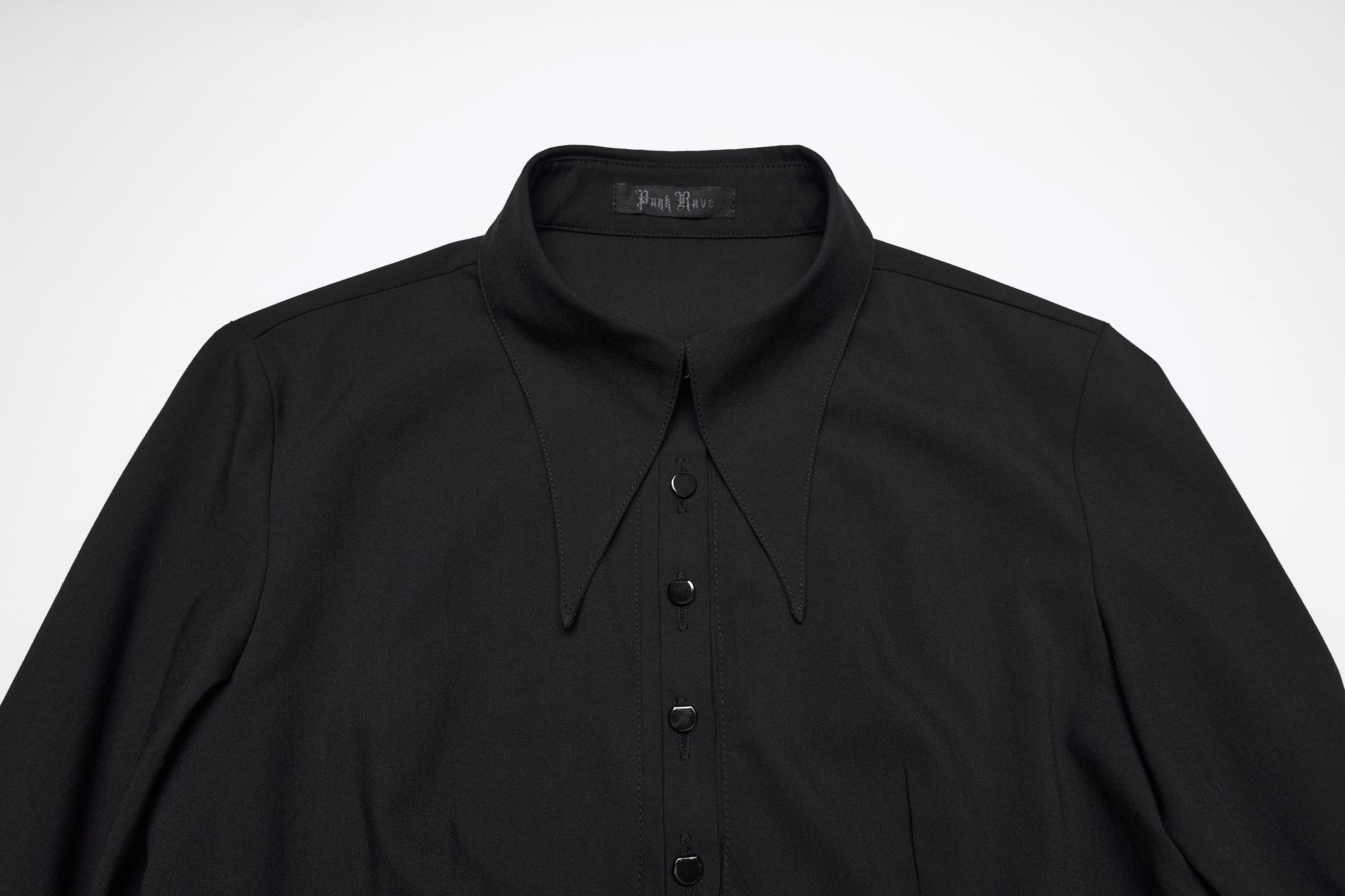 Punk Rave Nyx Asymmetrical Shirt Dress close-up showing collar and buttons in black fabric.