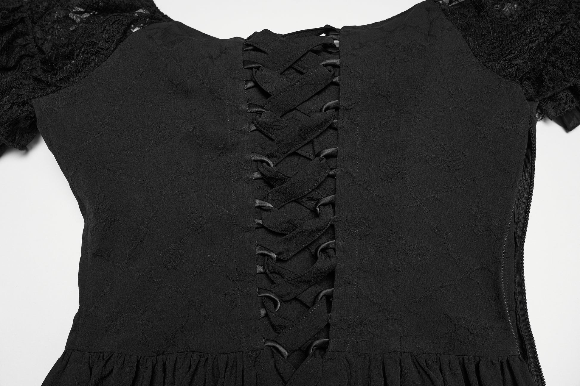 Close-up of the lace-up back of a goth maxi dress featuring delicate lace accents.