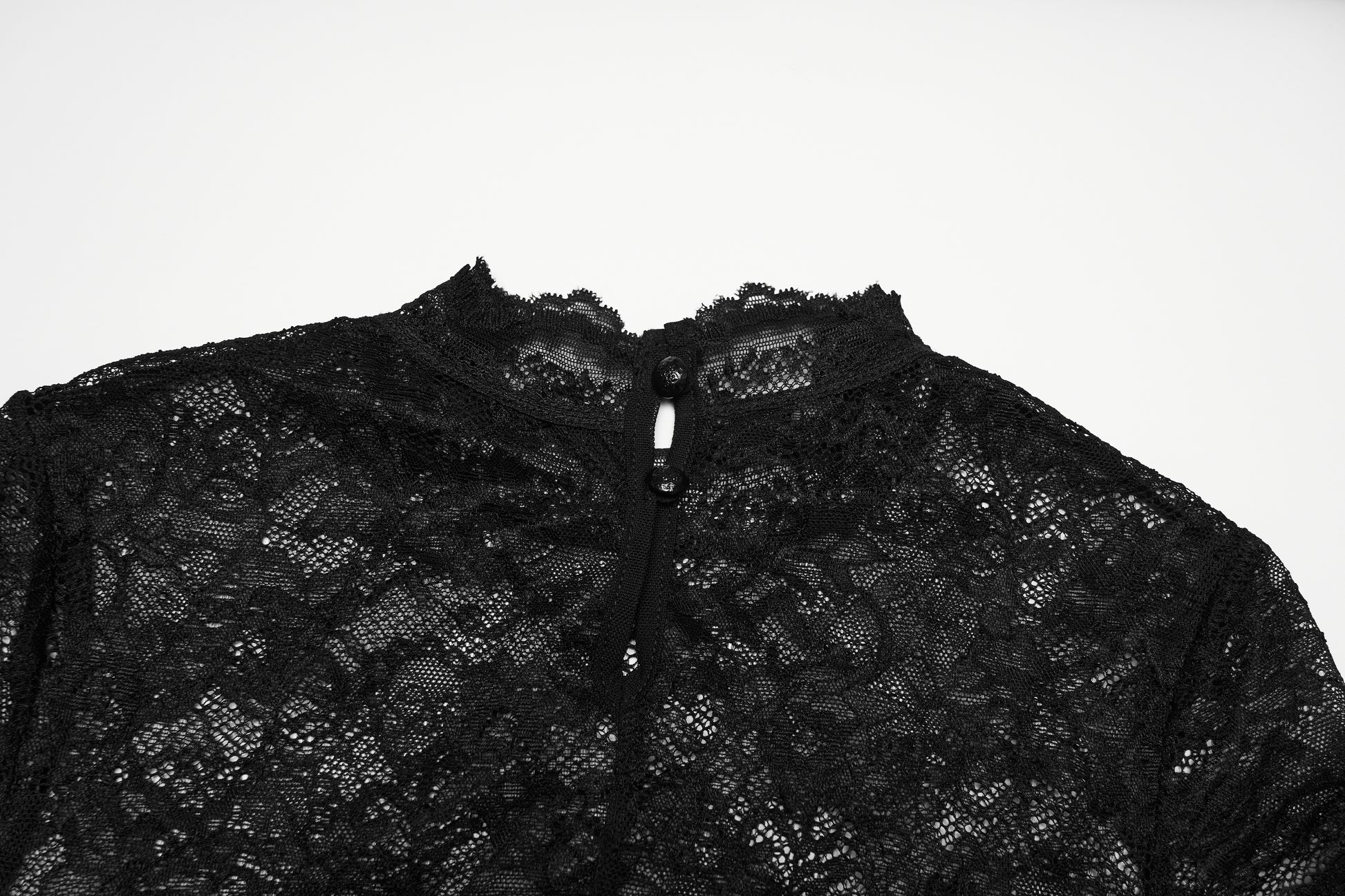 Close-up of the lace panel goth t shirt showcasing intricate black lace detail and button closure.