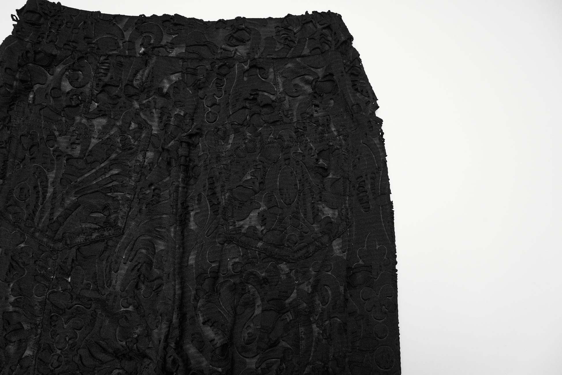 Punk Rave Morticia Jacquard Flared Pants showing intricate black fabric detail.