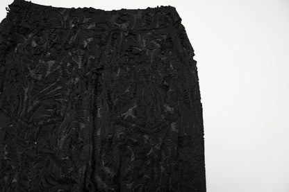 Punk Rave Morticia Jacquard Flared Pants showing intricate black fabric detail.