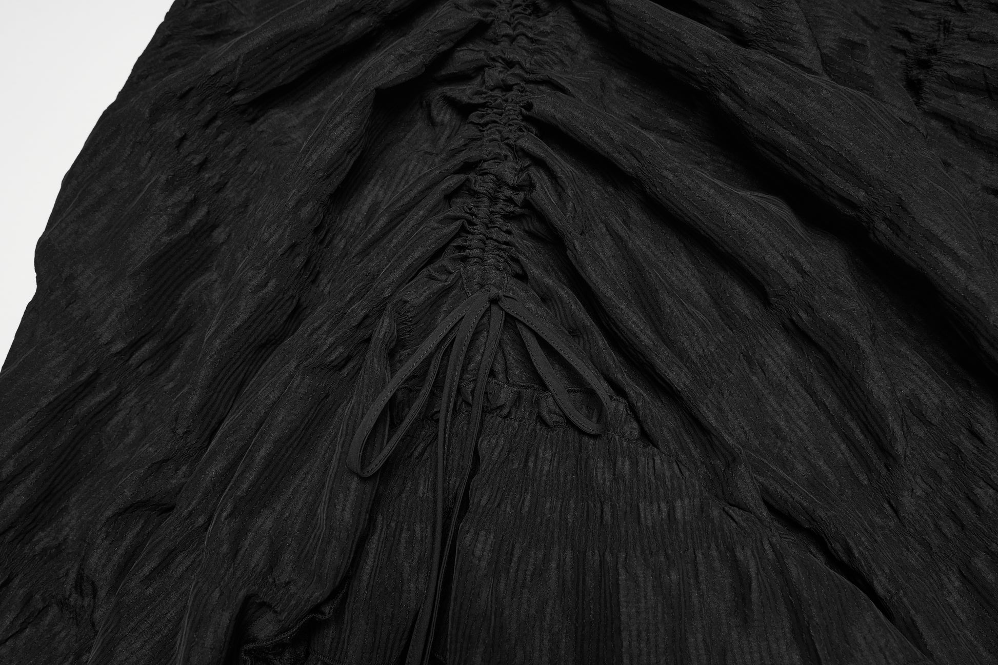 Punk Rave Morrigan Goth Pleated Retro Skirt showing intricate fabric texture and unique pleating details.