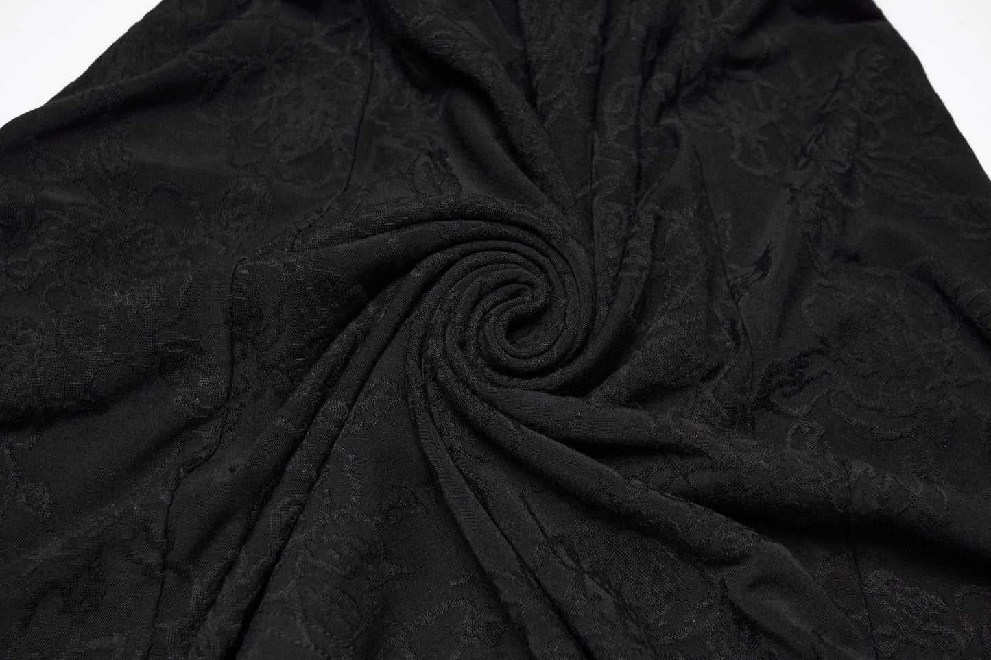 Textured jacquard fabric in black, showcasing the intricate pattern perfect for Punk Rave Seraphina Jacquard Halter Fish Tail Dress.