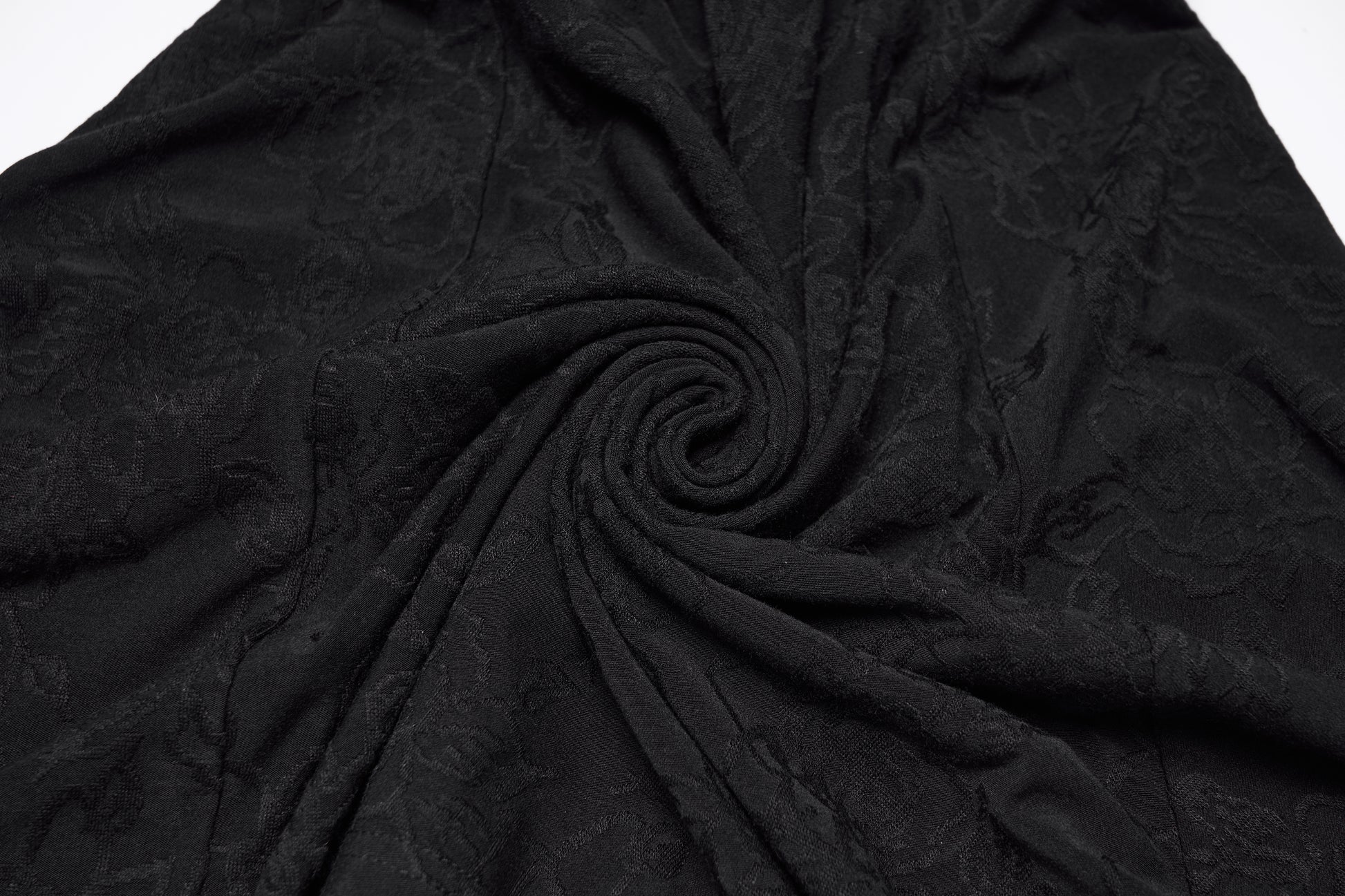 Textured jacquard fabric in black, showcasing the intricate pattern perfect for Punk Rave Seraphina Jacquard Halter Fish Tail Dress.