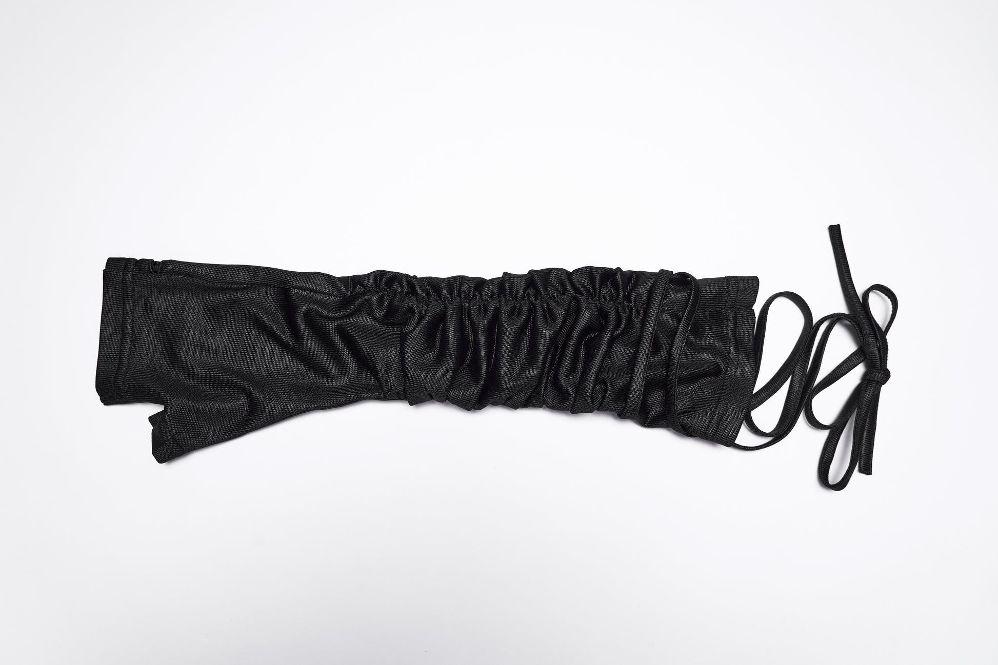 Goth fingerless strap gloves showing layered pleated fabric and tie detail, ideal for a punk style.