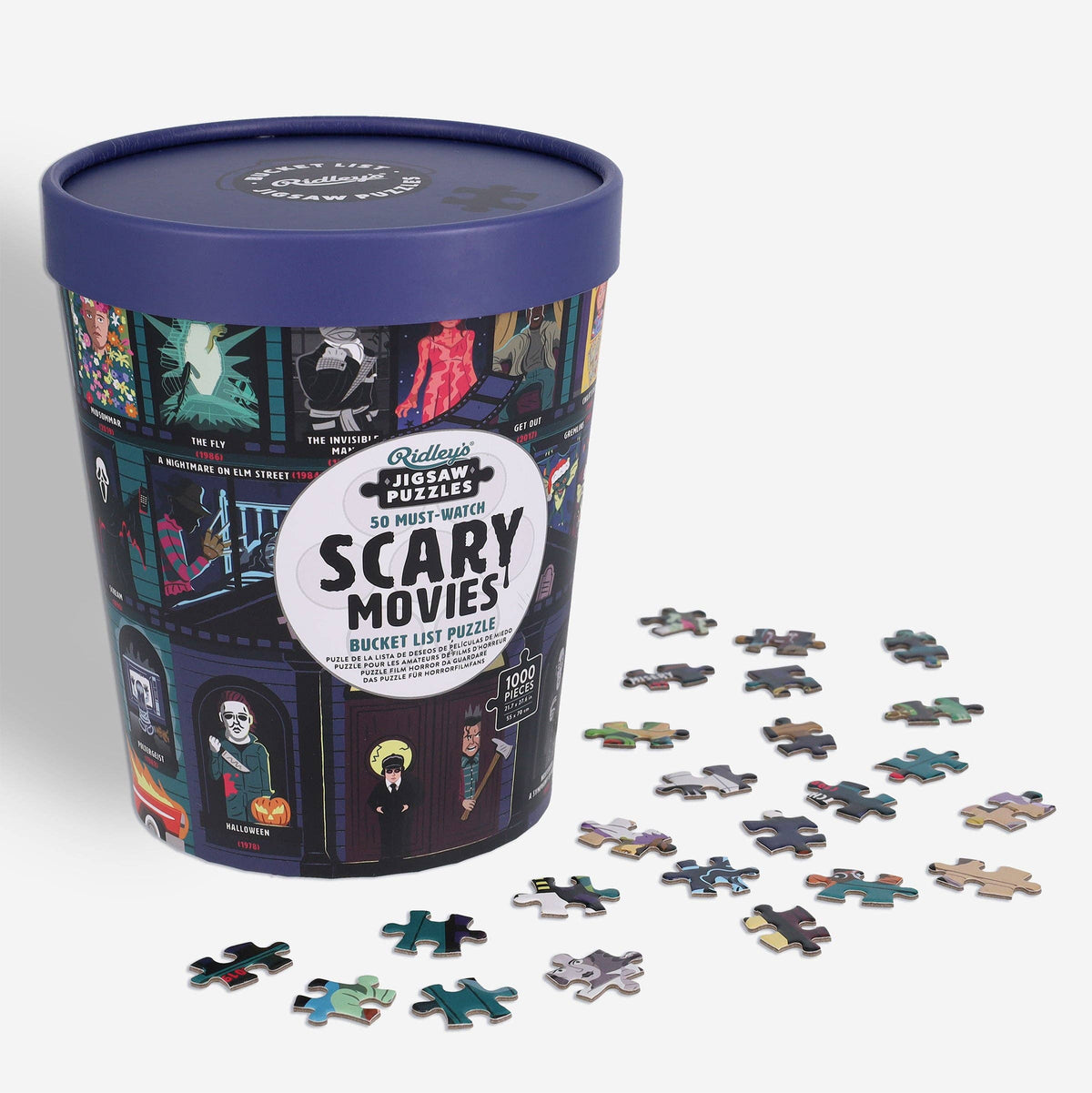 The puzzle tub with loose jigsaw pieces scattered beside it on a light grey background.