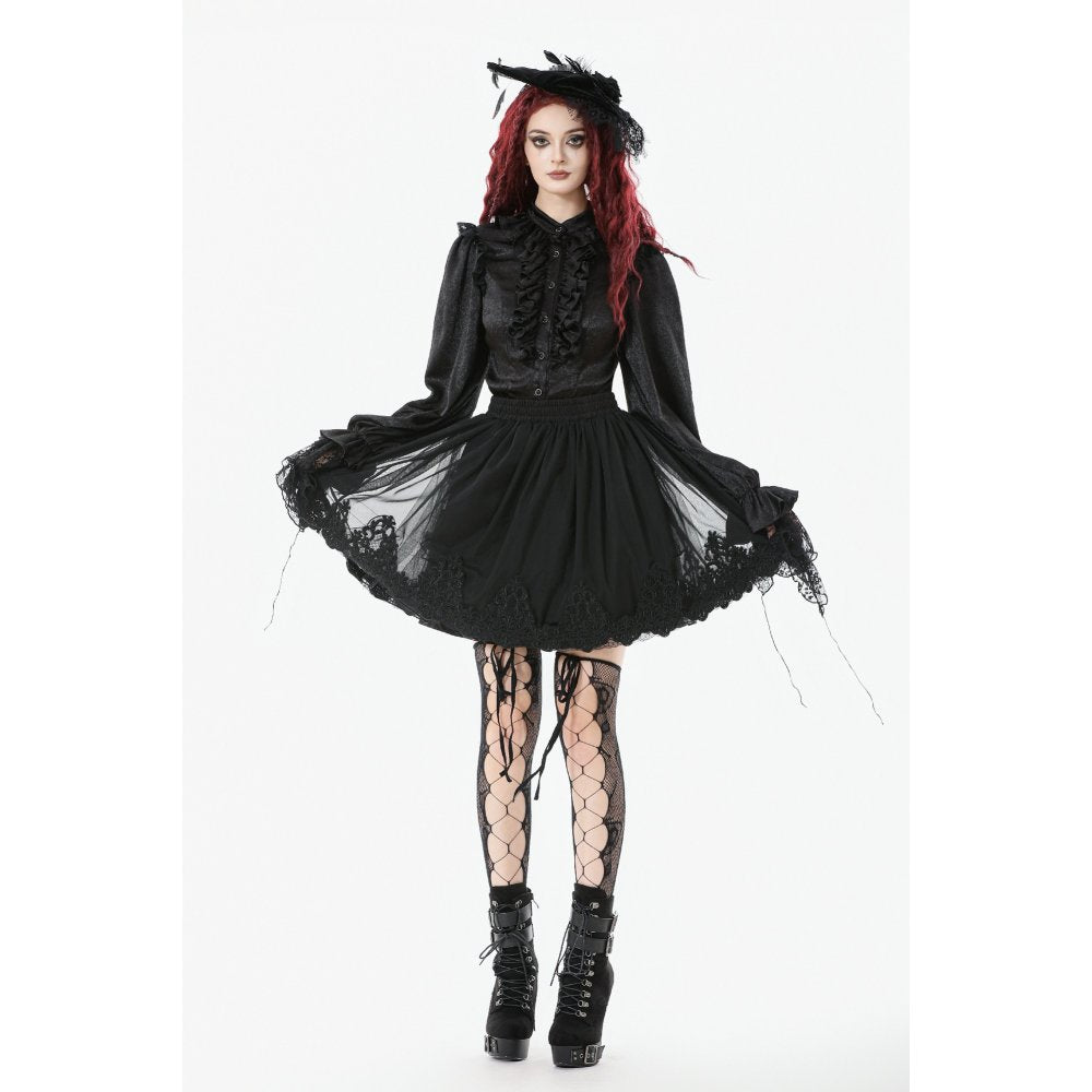 Model styling petticoat with Victorian blouse