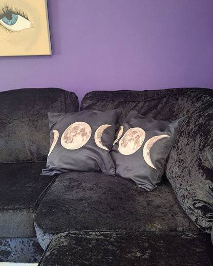 Triple Moon Goddess cushion on a sofa, gothic home décor