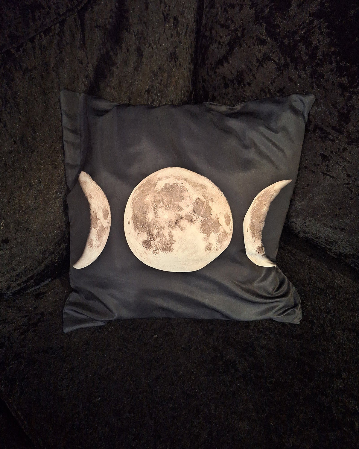 Close-up of the Triple Goddess moon print on the cushion cover