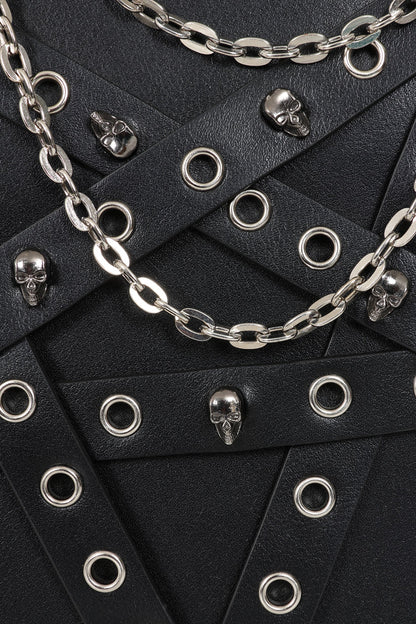 Banned Apparel Heartbreaker Harness Anatomical Heart Backpack closeup showing the skull suds, eyelets and chains