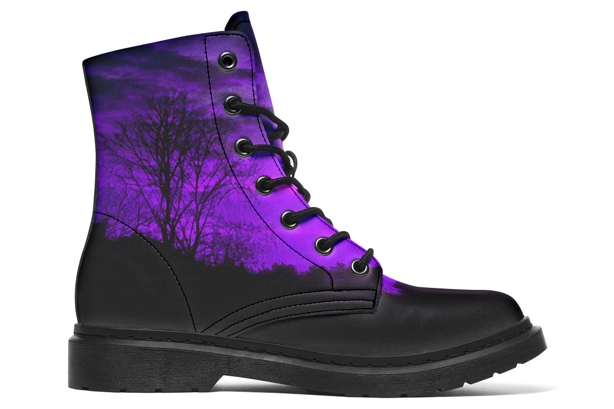 Black boot with purple tree pattern on a white background