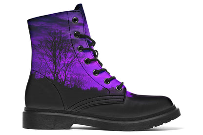 Black boot with purple tree pattern on a white background