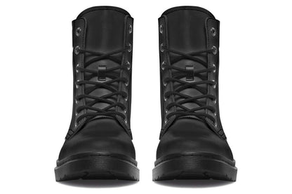 Pair of black combat boots on a white background