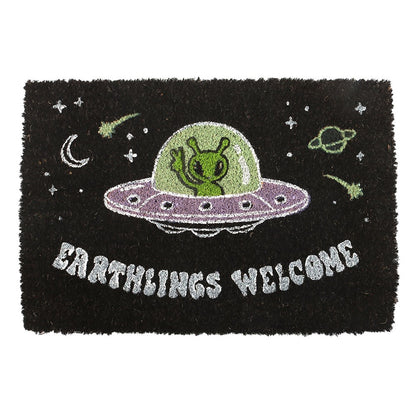Gothic Gifts Earthlings Welcome Alien Doormat with playful green alien in a purple UFO on a black background.