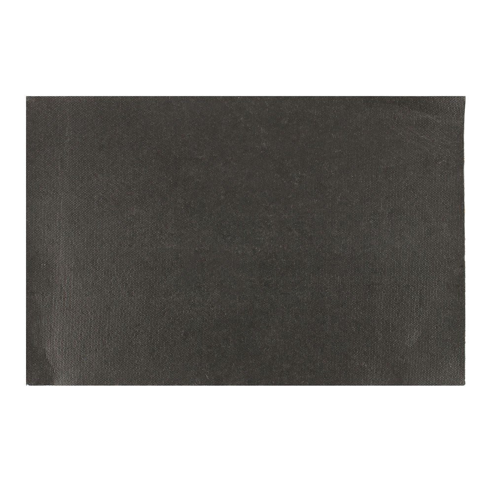 Black textured surface of a doormat, ideal for showcasing an Alien Doormat design.
