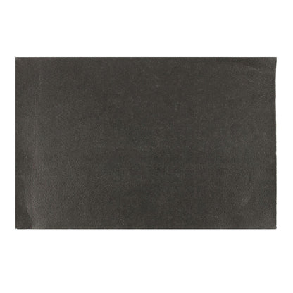 Black textured surface of a doormat, ideal for showcasing an Alien Doormat design.