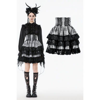Gothic Lolita outfit with black and white dress, boots, and headpiece on a white background.
