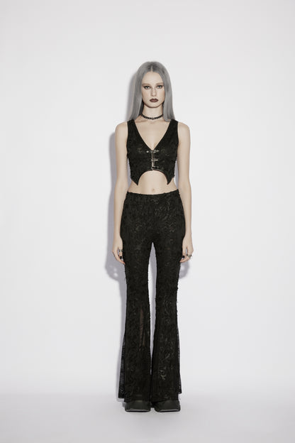 Model wearing Punk Rave Morticia Jacquard Flared Pants with a black crop top, showcasing a gothic fashion style.