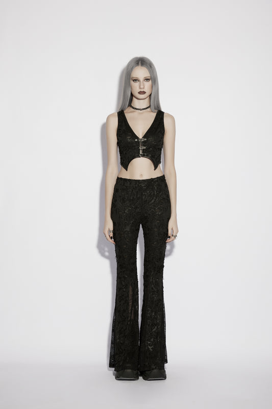Model wearing Punk Rave Morticia Jacquard Flared Pants with a black crop top, showcasing a gothic fashion style.