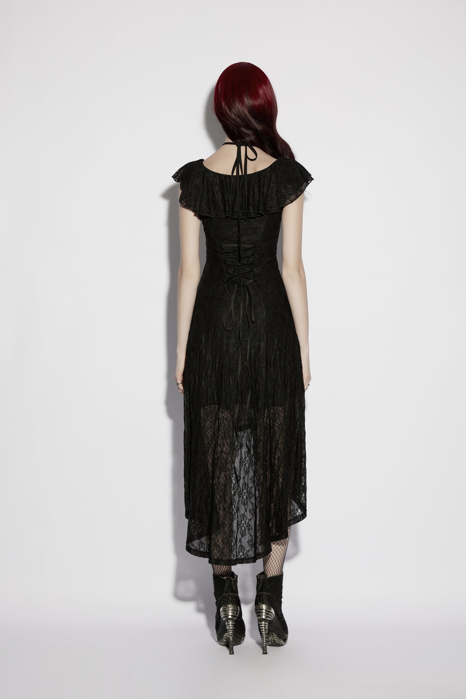 Back view of a goth flying sleeve dress featuring lace detail and asymmetrical hemline.