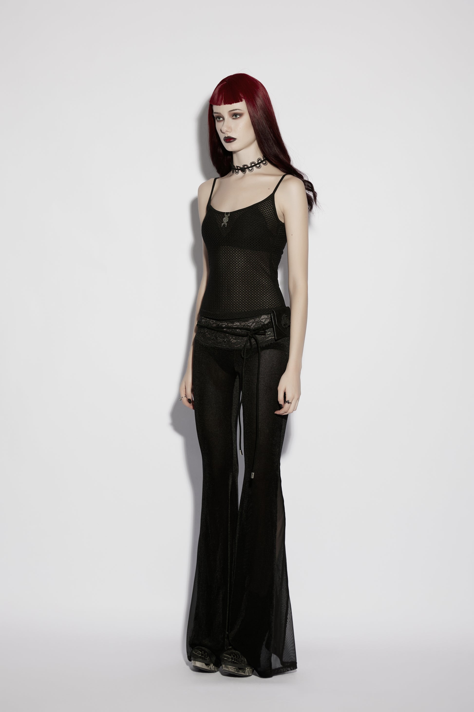 Model wearing a mesh goth camisole, showcasing the Punk Rave Nyx sheer cami top with a minimalistic, edgy look.