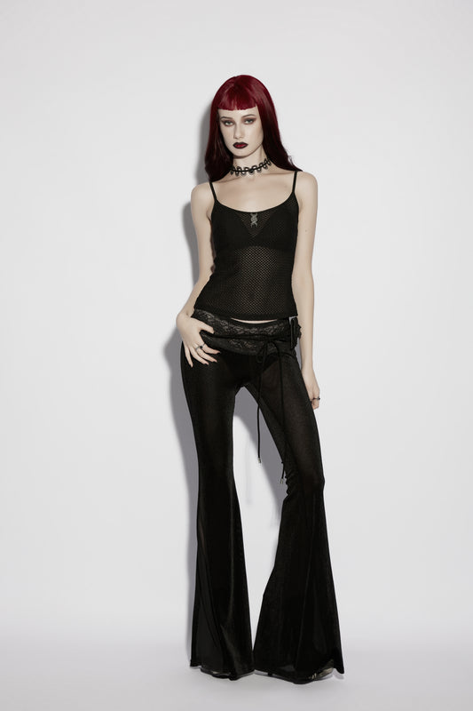 Model wearing Punk Rave Lilith Low Waist Flared Pants paired with a sheer black top and accessories.