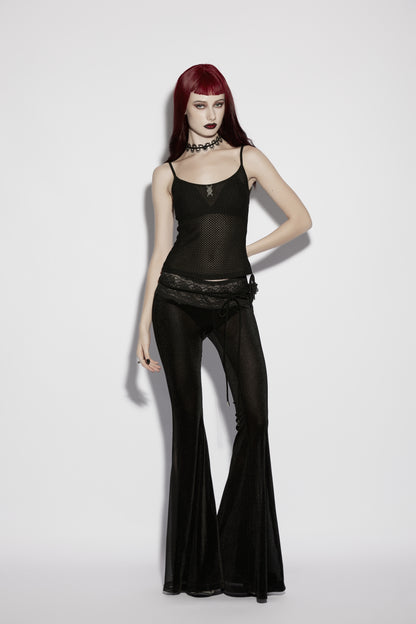 Model wearing a mesh goth camisole paired with flared black pants, showcasing a punk rave gothic style.