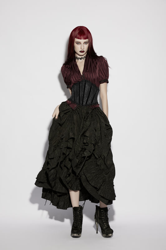 Model showcasing the Punk Rave Morrigan Goth Pleated Retro Skirt with dramatic silhouette and dark gothic elegance.