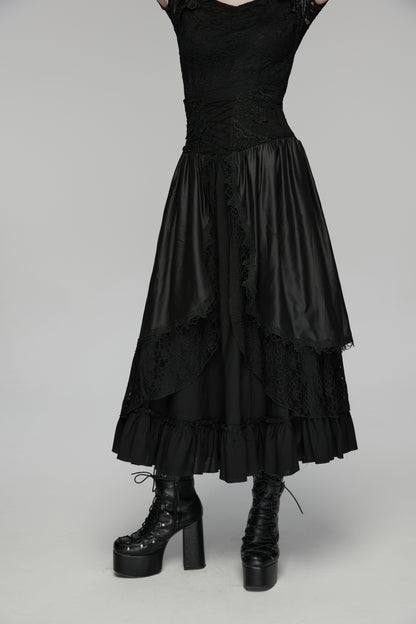 Goth layered skirt with flowing layers and dark romantic texture, paired with chunky black platform boots.