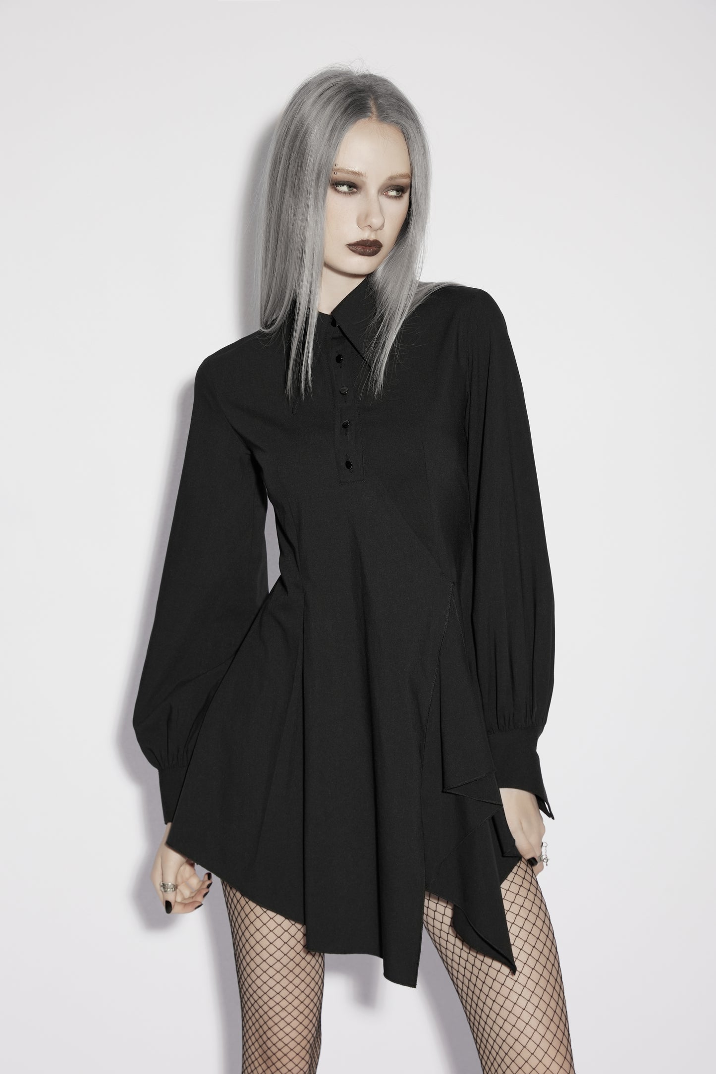 Model wearing the Punk Rave Nyx Asymmetrical Shirt Dress, showcasing its tailored design and flowing elegance.