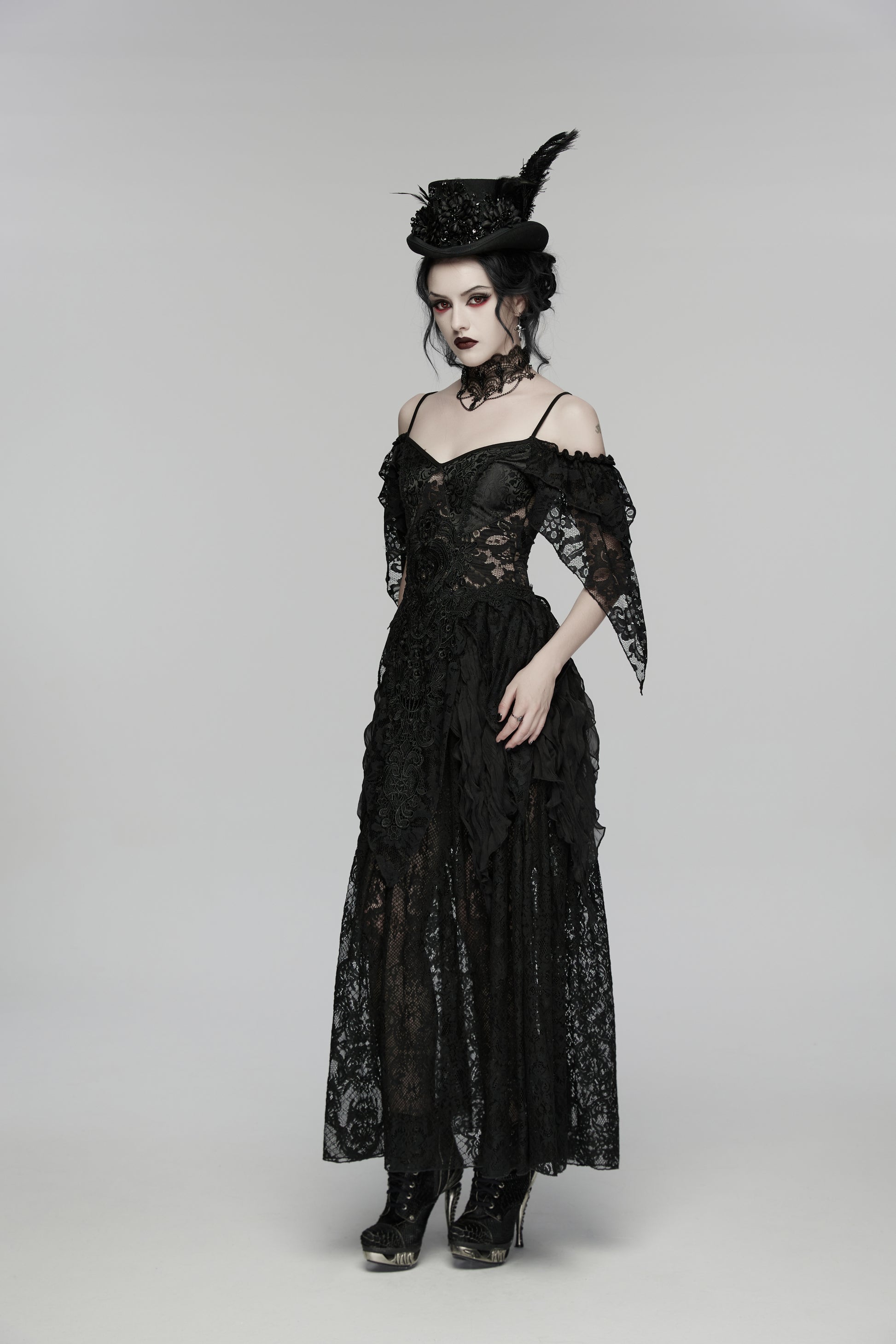 Model wearing a black gown with the Punk Rave Goth Retro Feather Formal Hat for a gothic fashion look.