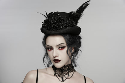Model wearing a goth feather formal hat with floral embellishments and feathers, showcasing gothic retro style.
