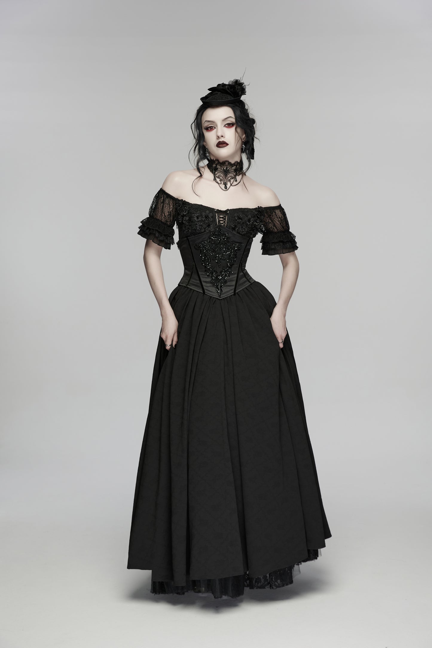 Goth maxi dress in elegant black with off-the-shoulder design and lace accents, showcasing gothic romance and feminine style.