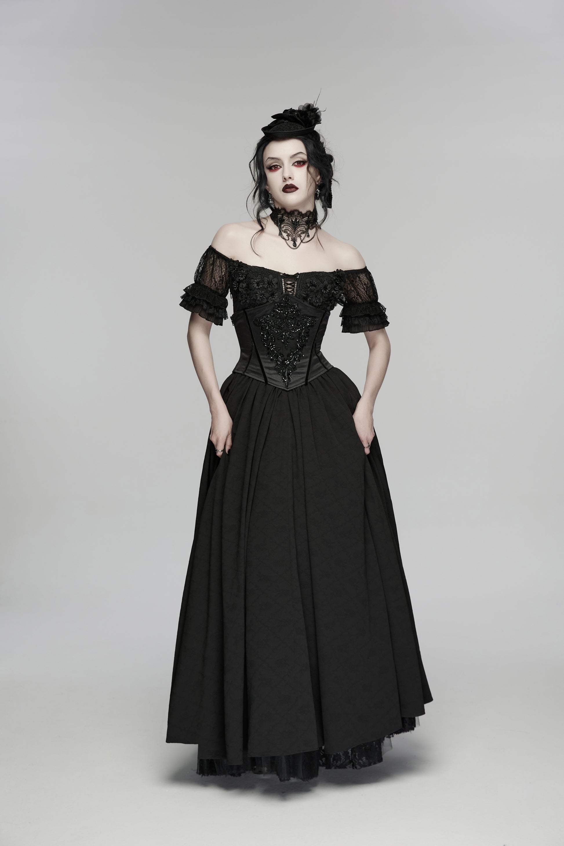 Goth maxi dress in elegant black with off-the-shoulder design and lace accents, showcasing gothic romance and feminine style.