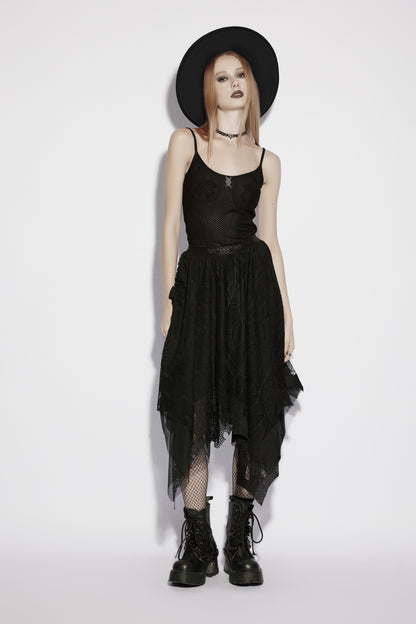 Model showcasing a mesh goth camisole styled with a layered skirt, black boots, and a wide-brimmed hat.