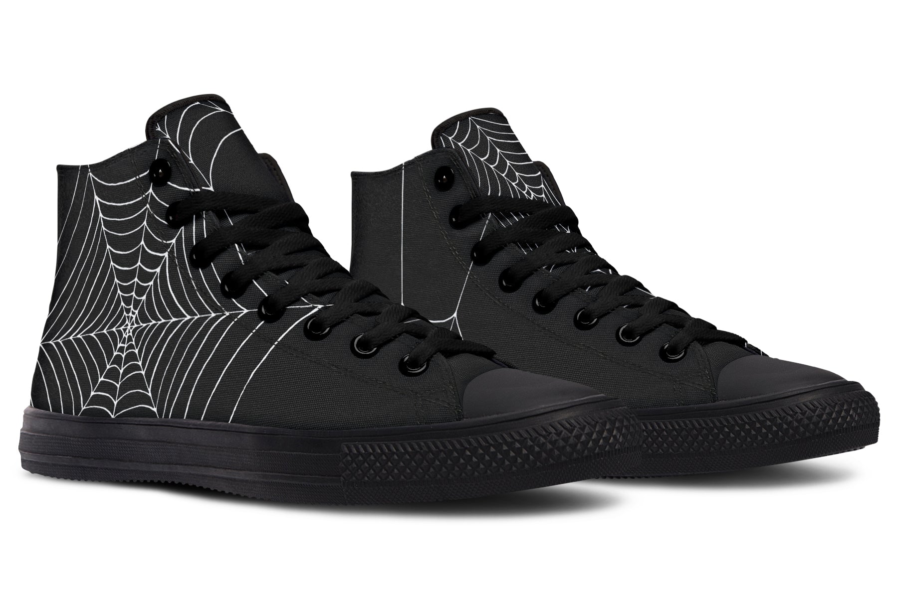 Black high-top sneakers with spider web design on a white background