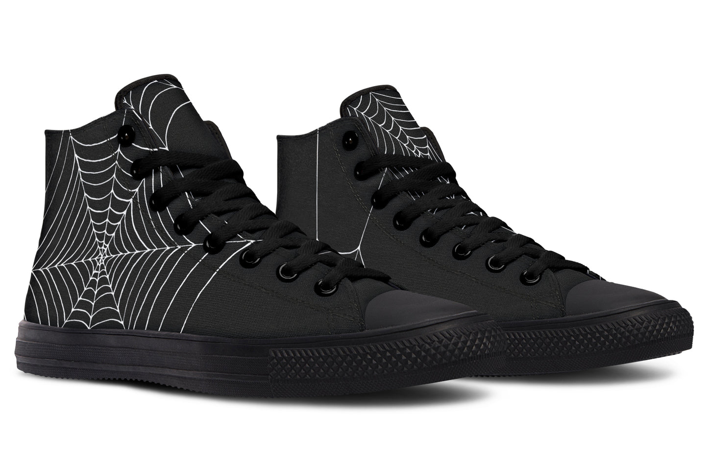Black high-top sneakers with spider web design on a white background