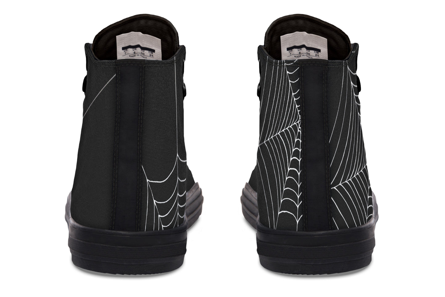 Black high-top sneakers with spider web design on a white background
