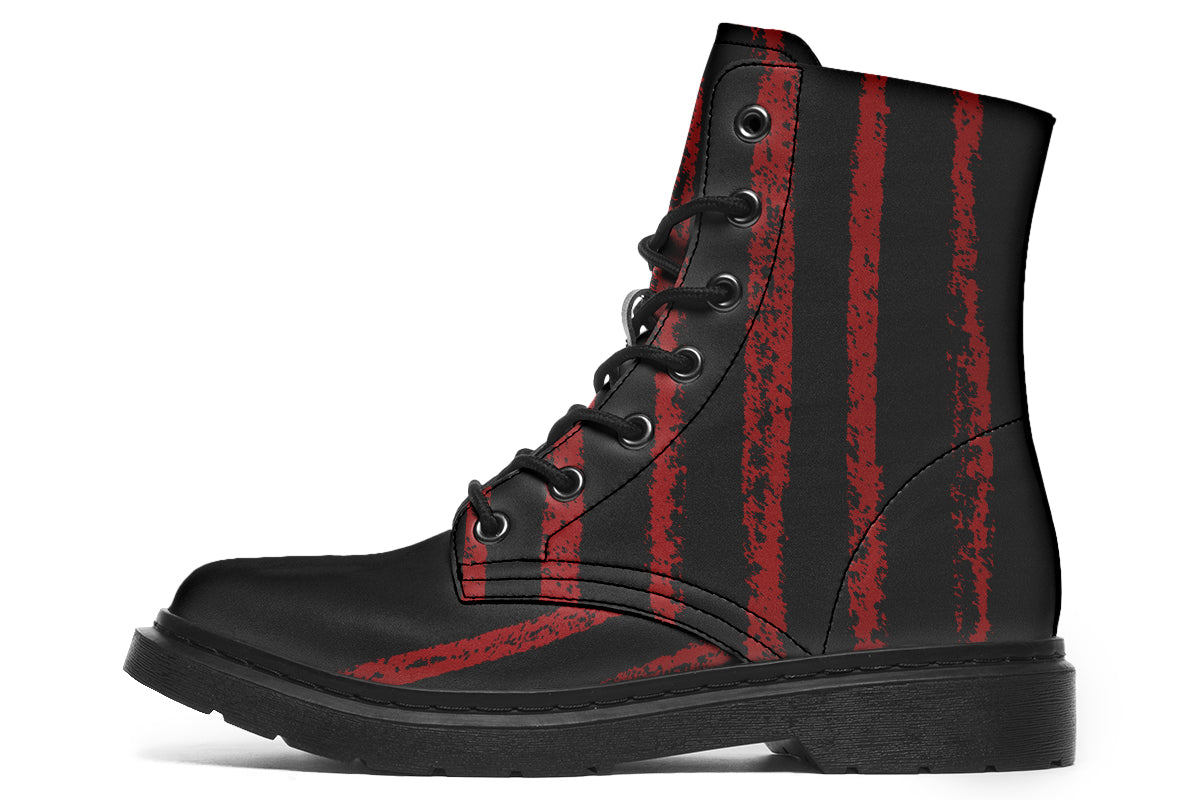 Black boot with red striped pattern on a white background