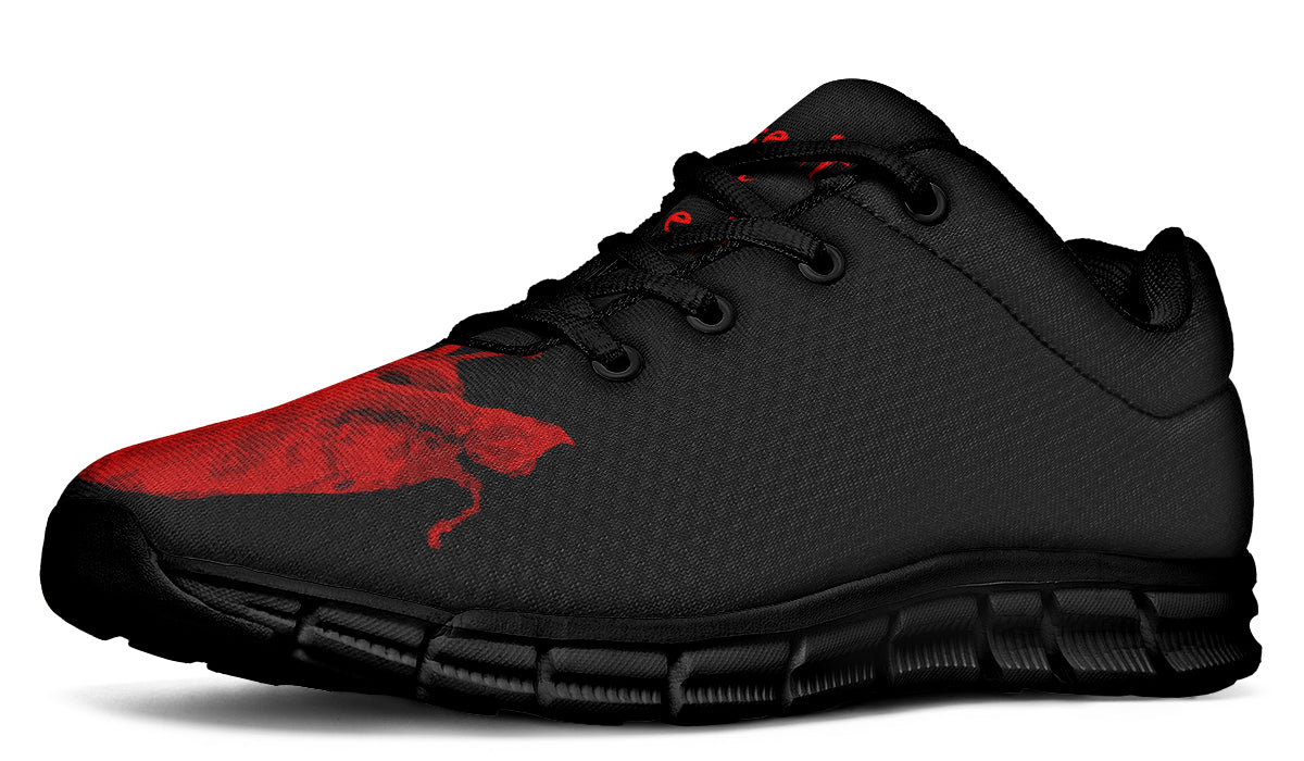 Black and red sneaker on a white background