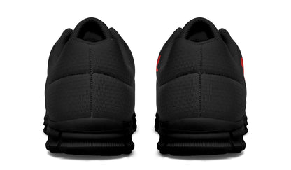 Black athletic shoes shown from the back on a white background