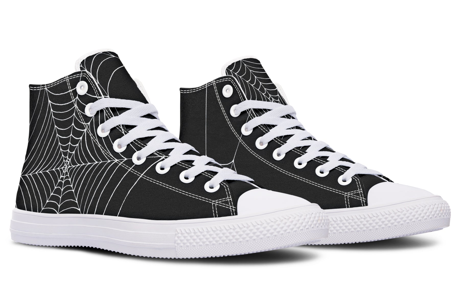 Black high-top sneakers with white spider web pattern on a white background